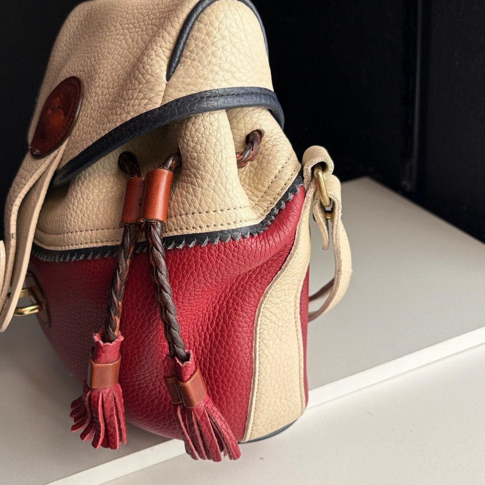 Dooney and Bourke awl leather Teton Drawstring Bag
Rouge Bone Navy - Picture 6 of 16